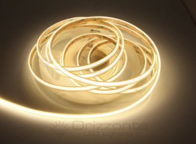 Immagine di Striscia led COB 5m bianco caldo 3000K CRI Ra>90 400led/m 12V 10W/m PCB 5mm IP64 tubo di silicone estruso bordi pieni interno vuoto